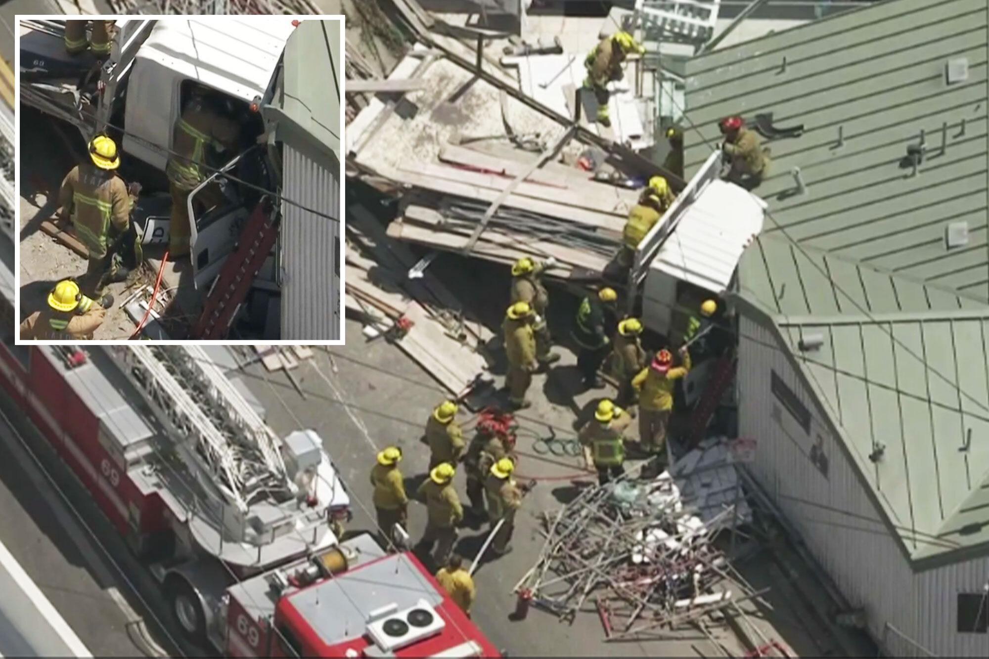 Truck driver stuck in vehicle after smashing into building on Pacific Coast Highway comp 12 5