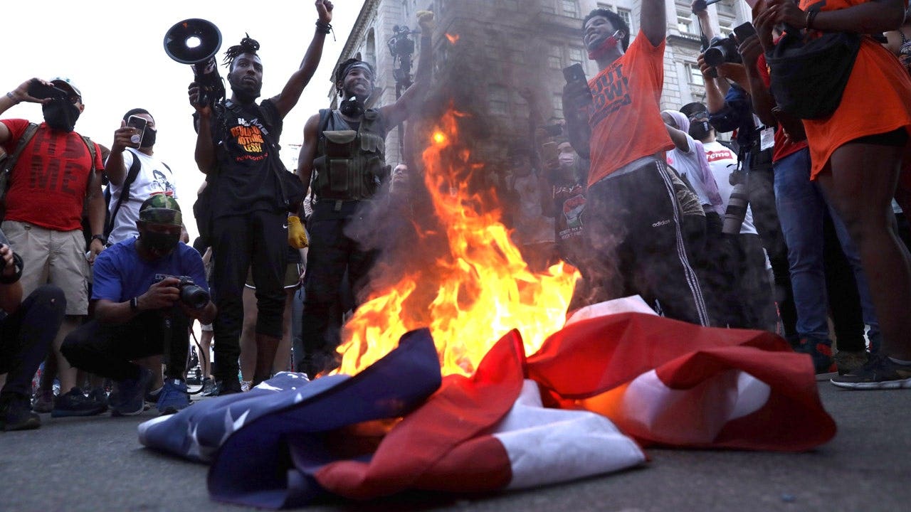 Capitol culture war heats up as GOP lawmaker targets DC schools over Old Glory snub lag burning