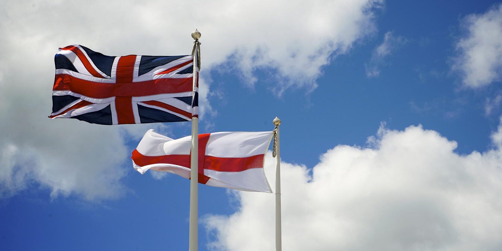 UK Govt Minister Calls for Removal of ‘Unsettling, Intimidating’ British Flags. lags e1781739795208