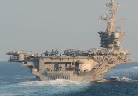Top Admiral Praises Sailors but Concedes Hardships After Visit to U.S.S. Lincoln