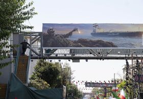 US warned of ‘October surprise’ from Iran amid harrowing billboards and murals