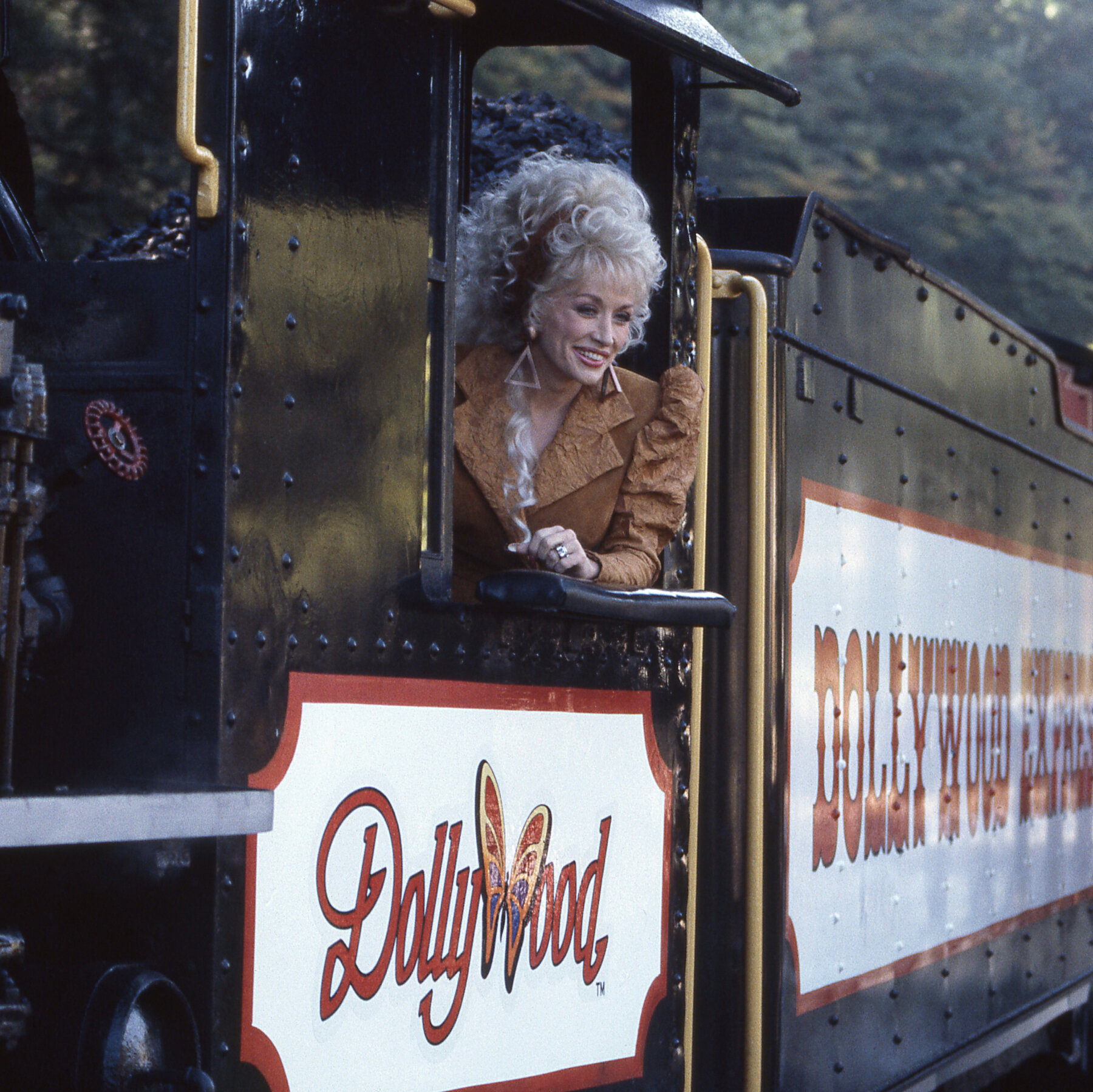 How Dollywood Captured the Essence of Dolly Parton 26cul dolly dollywood hmqb mediumSquareAt3X