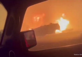 Raging wildfire forces 20,000 to flee in Canada (VIDEO)