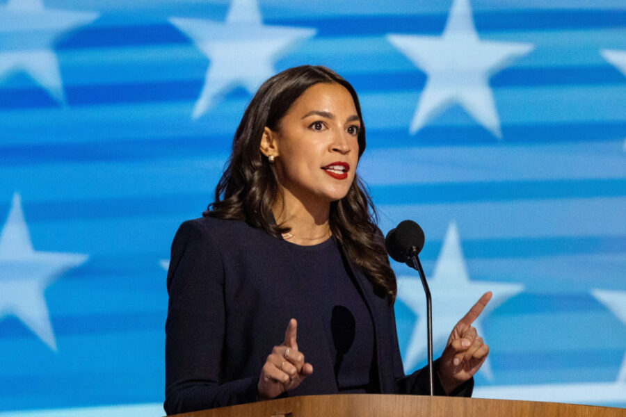 AOC Splits From Longtime Fiancé After Head-Scratching Social Media Post AOC speechShutterstock 2509696341 e1757613344334