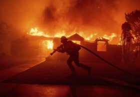 Tens of Thousands of People Evacuate as Wildfires Spread