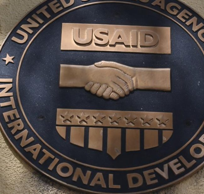 After guilty plea to defrauding a USAID-funded charity, she has to repay the government $160,000
