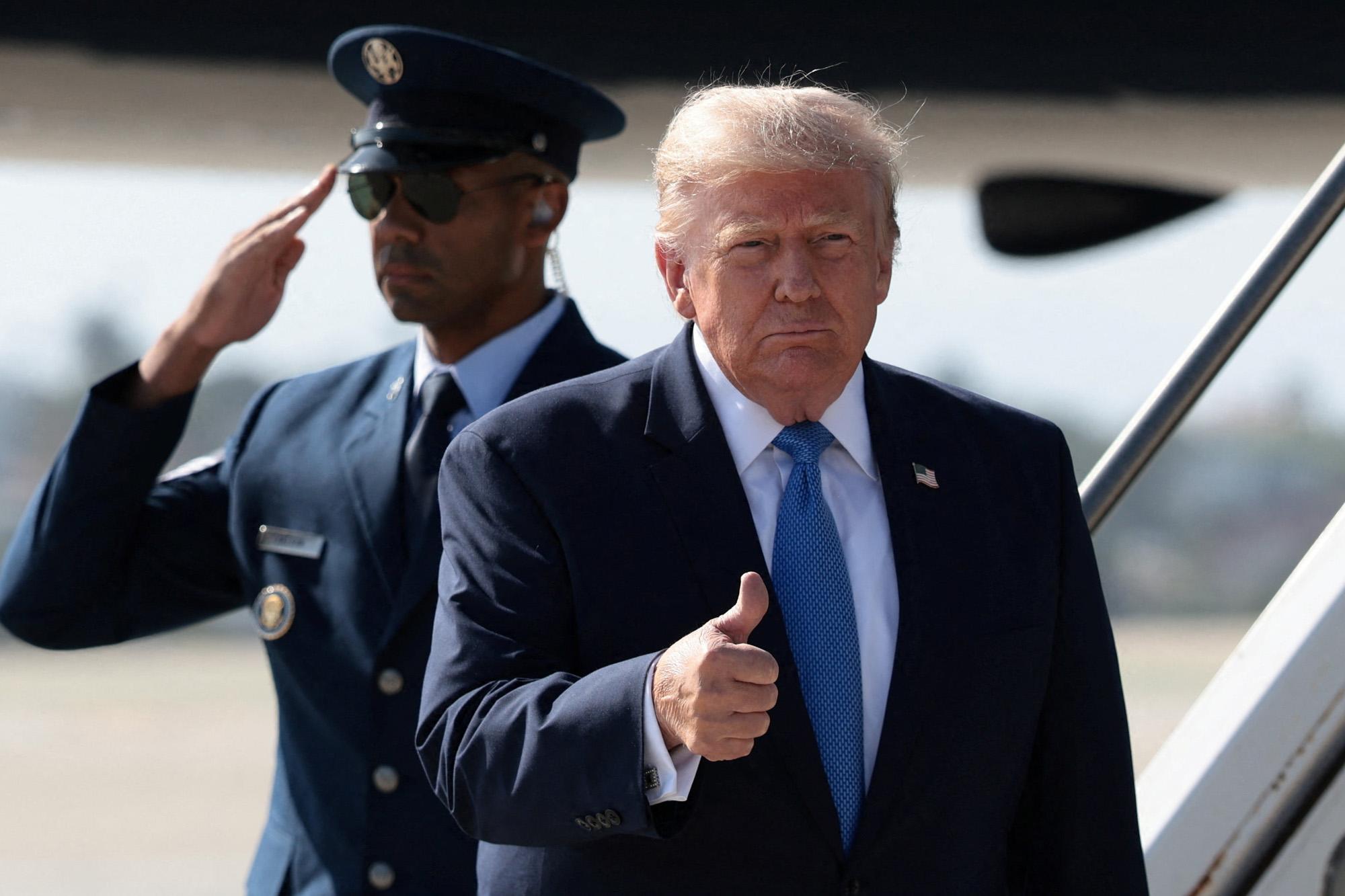 President Trump lands in Los Angeles for SoCal visit and fundraiser aerial view homes homes destroyed 136487803