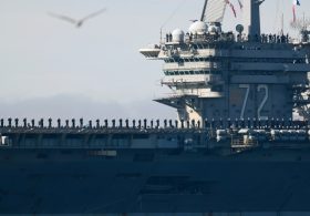Burned-out US aircraft carrier sailors near Iran tried to jump overboard – media