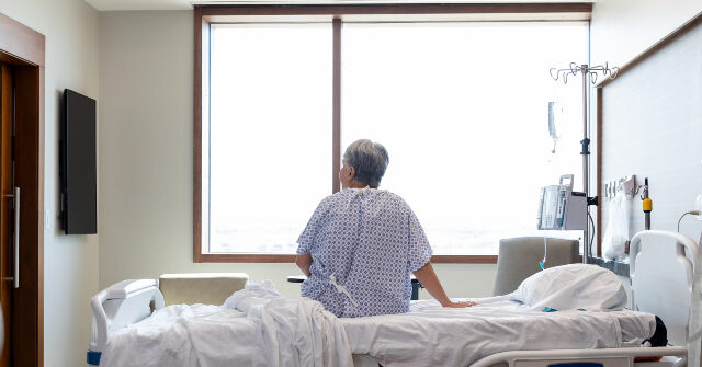 PHOTOS -- Nurses Help Fulfill Patient's Last Wish to Be Baptized: 'A Total God Thing' elderly woman in hospital 640x335 1
