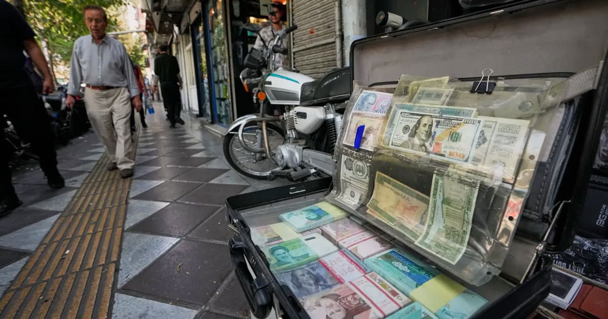Iran’s Currency Crashes to Record Low as New U.S. Sanctions Hammer Economy iranian rial currency plunge us economic sanctions