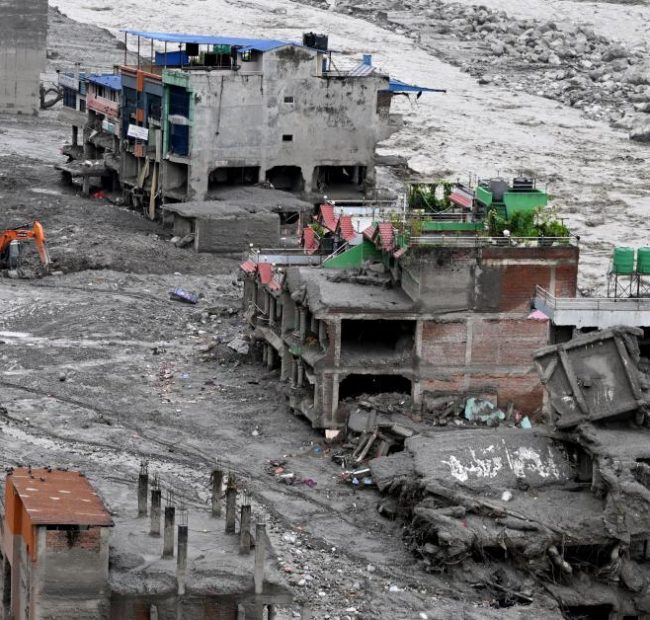 Rescuers scramble to reach workers believed to be trapped in hydropower tunnels amid Nepal floods