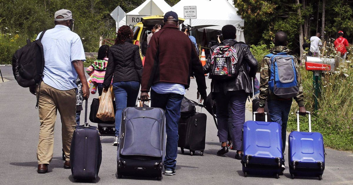 Trump DOJ Launches Largest Denaturalization Crackdown in U.S History migrants luggage deportation
