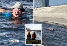 Bizarre moment woman caught casually floating down notorious LA River