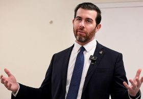 Socialist in Trump country gives Karl Marx vision thumbs-up before ducking key tax question