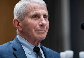 Fauci mistook the microphone for a throne