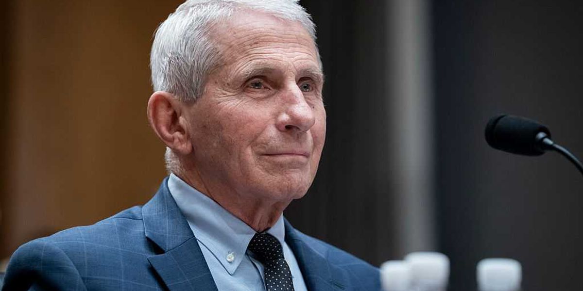 Fauci mistook the microphone for a throne or a throne