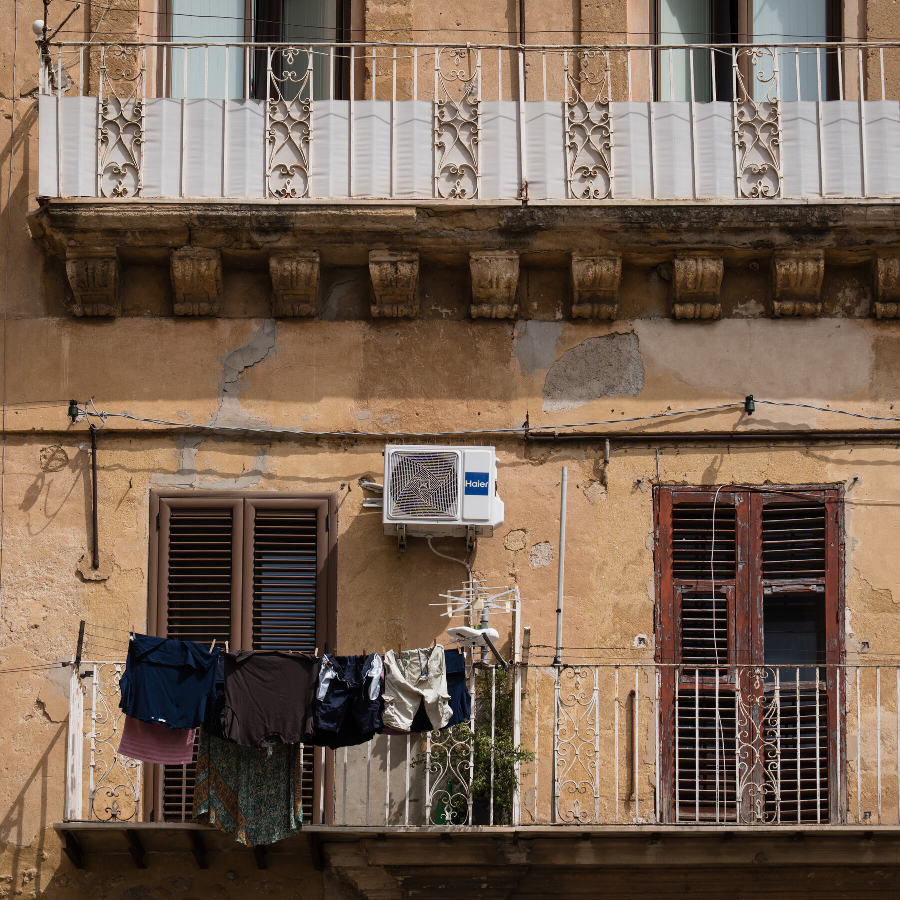 Many Italians Long Resisted Air-Conditioning. Then Europe Got Hotter. 03Italy AC 01 tcbq mediumSquareAt3X