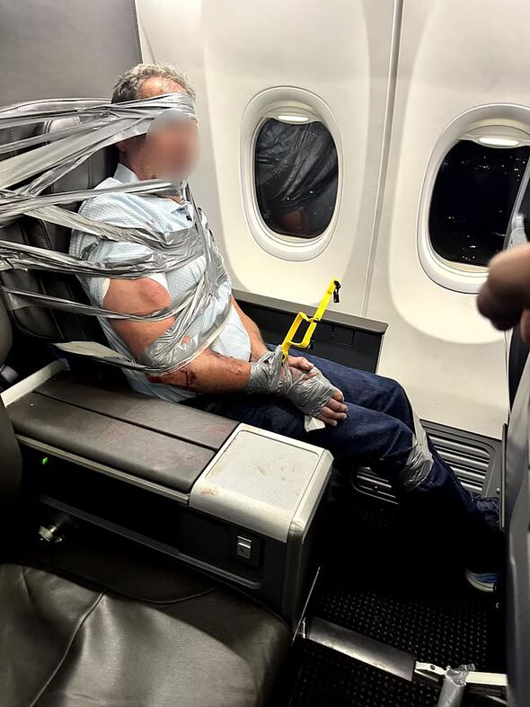American Airlines flight diverted after passenger needed to be duct-taped to seat 215407 1