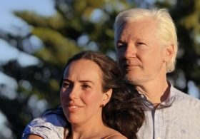 Julian Assange reveals he is expecting his third child with wife Stella…