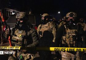 ICE agent charged with lying about shooting Venezuelan man during crackdown