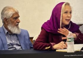 Christian Gillibrand in a Hijab Pandering to a Radical Imam