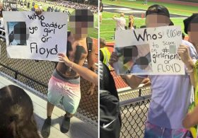 Long Island high school promises to discipline students who taunted rival football team with tasteless signs