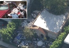 Notorious LA “trash house” sparks outrage again as new images reveal new mountains of debris: ‘This should be grounds for losing your house’