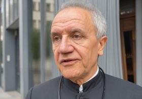 Italian Priest Flips Off Masked Far Left Mob After Sheltering Terrified Tourists