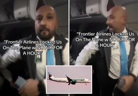 Frontier flight attendant pushes screaming passenger who appears to try to open exit door after flight is stranded at gate