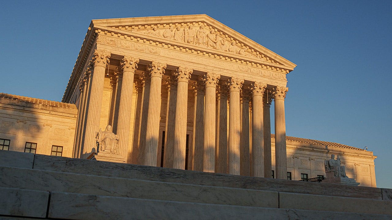 Can cooking for terrorists bar asylum? Supreme Court takes up unusual case with broader immigration stakes Supreme Court at dusk 1