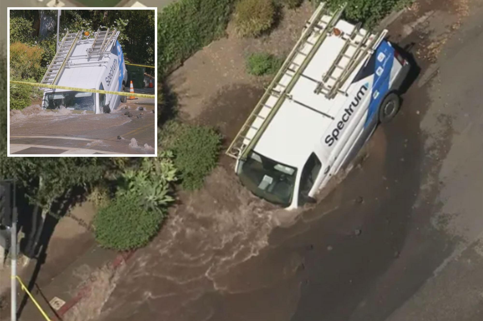 Massive sinkhole opens up on busy Los Angeles street swallowing entire van comp 8 1