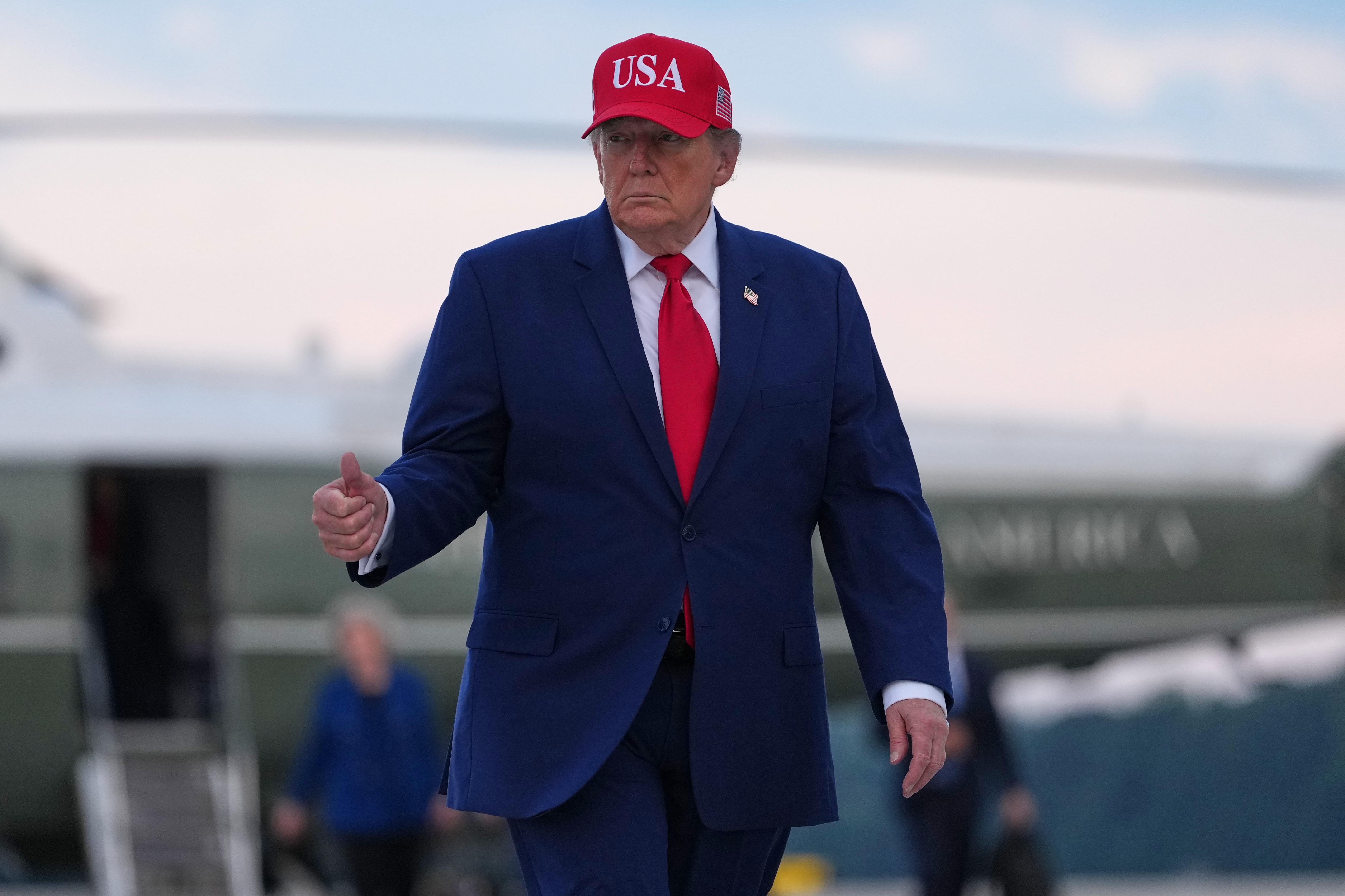 Trump puts Russia sanctions package on hold, says pause is in national interest crop 41378651