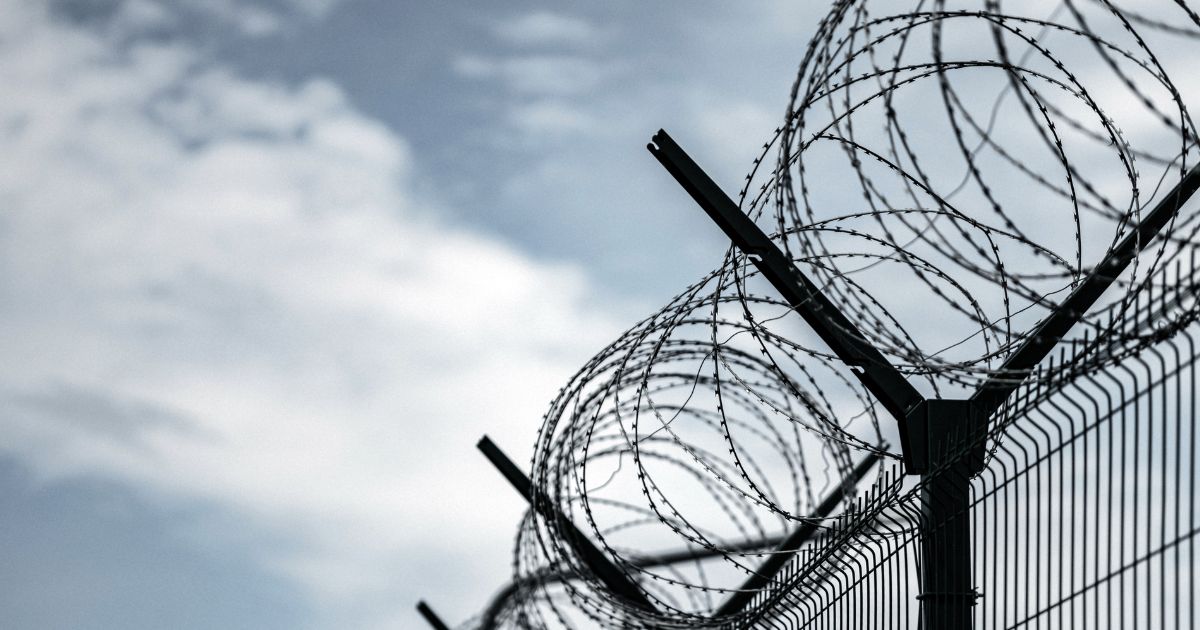 Democrats Campaigning Against Their Own Congressional Nominee Who Happens to Be in Federal Prison eature Image 2026 10 10T001633500