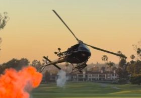 Stunt Chopper at Navy SEAL Fundraiser Thrills Guests With Small Explosions and Red, White and Blue Smoke Show