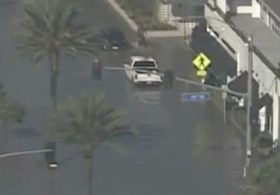 Ocean Water Floods Homes on Newport Beach’s Balboa Peninsula as Tropical Storm Rachel Barrels Toward Southern California