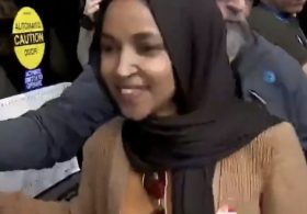 Ilhan Omar’s Handlers Rush Her Away from the Press as She Remains Defiant Amid Questions About Federal Investigations
