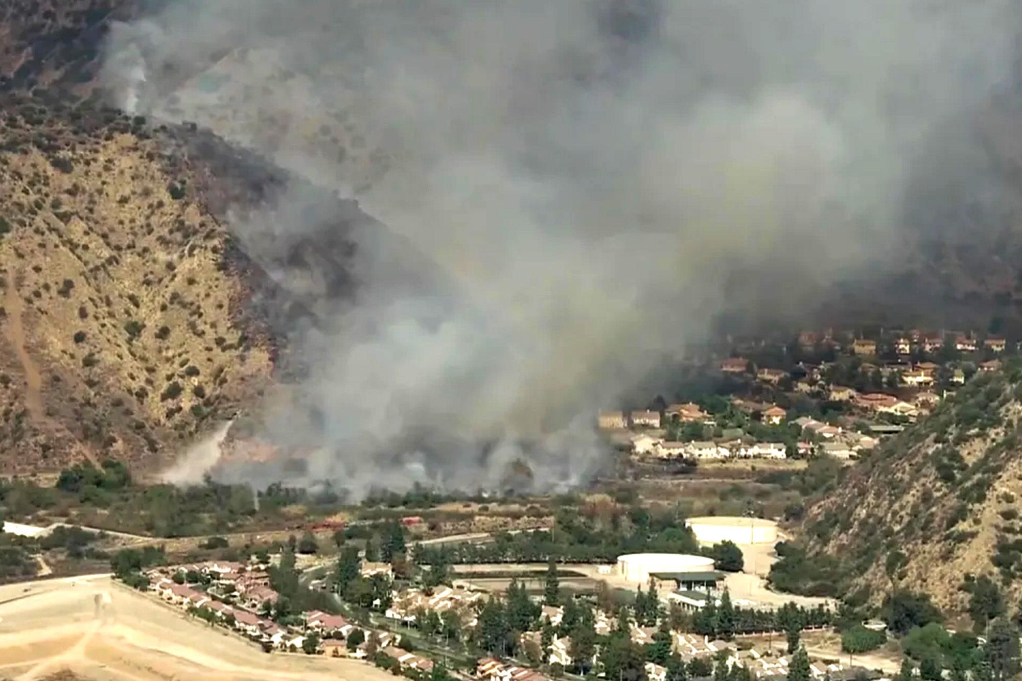 Wind-fueled wildfire breaks out in Malibu as power cut to thousands of homes ire 4