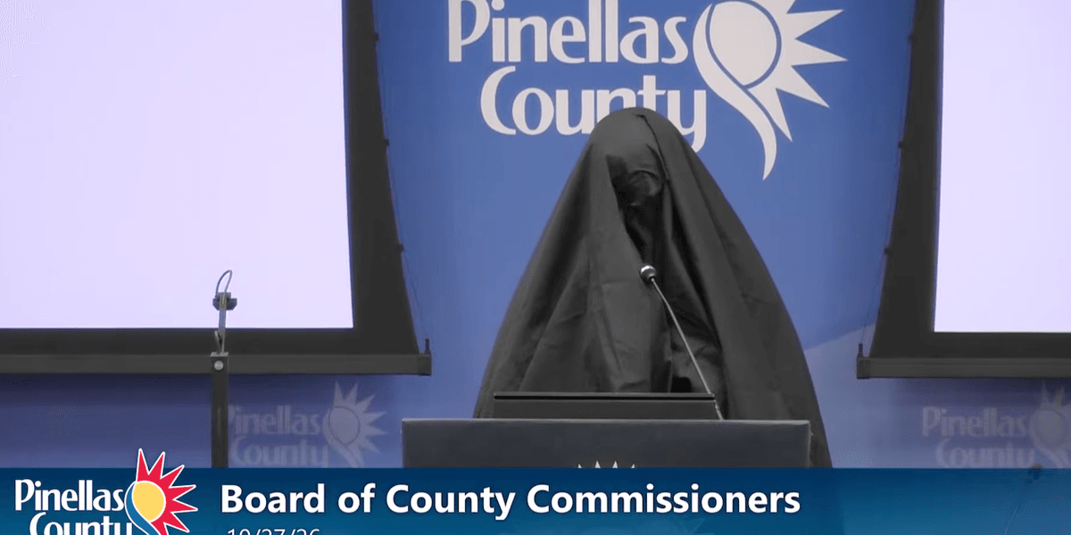 Female wearing Muslim burqa stands at mic during Florida public meeting, reports say. What she does next gets her kicked out. lorida public meeting reports say what she does next gets her kicked out
