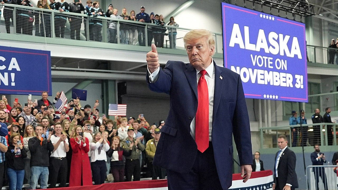 Trump says 'we are looking into' other Dan Sullivan on Alaska ballot, warns about governor's race trump gestures campaign rally wasilla alaska