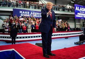 Trump signs pardons for Alaska diesel mechanics onstage during rally touting major energy deals