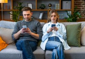 Couple Worries Having A Baby Could Cut Into Time They Spend Sitting On The Couch Staring At Their Phones