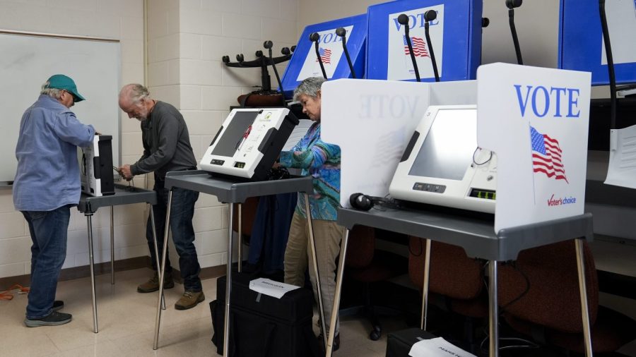 NC elections officials alter mail ballot rules just before they’re mailed out AP24290840033100 e1729170830781