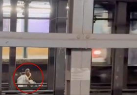 Young man and woman caught on video sitting on NYC subway tracks before being fatally struck 